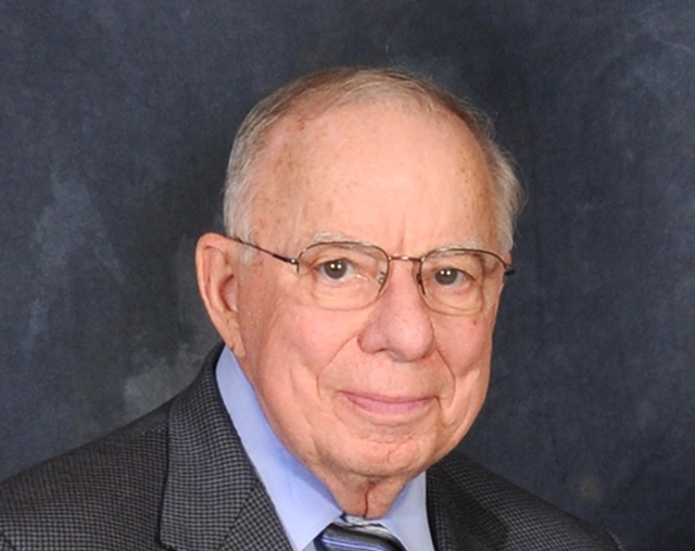Dr. E. Malcolm Field